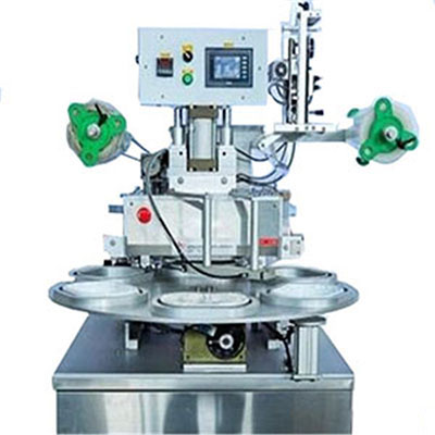 ROTARY SEALING MACHINE